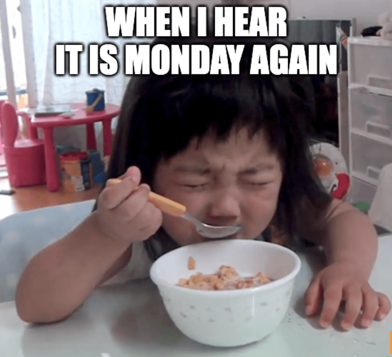 Baby being tired eating breakfast